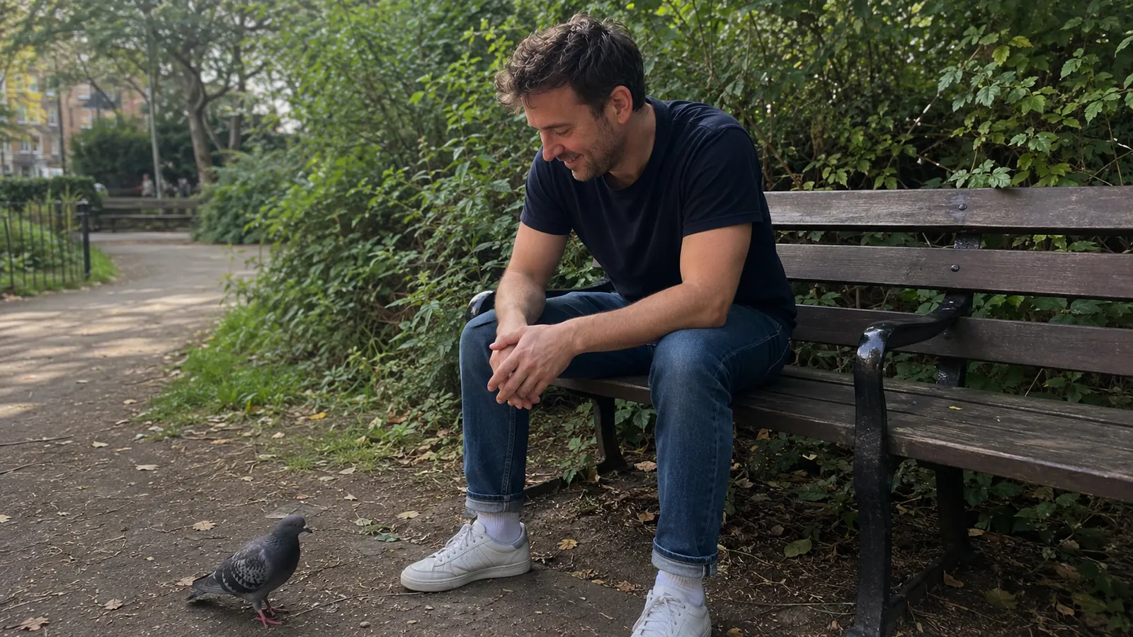 A man sitting on a park bench